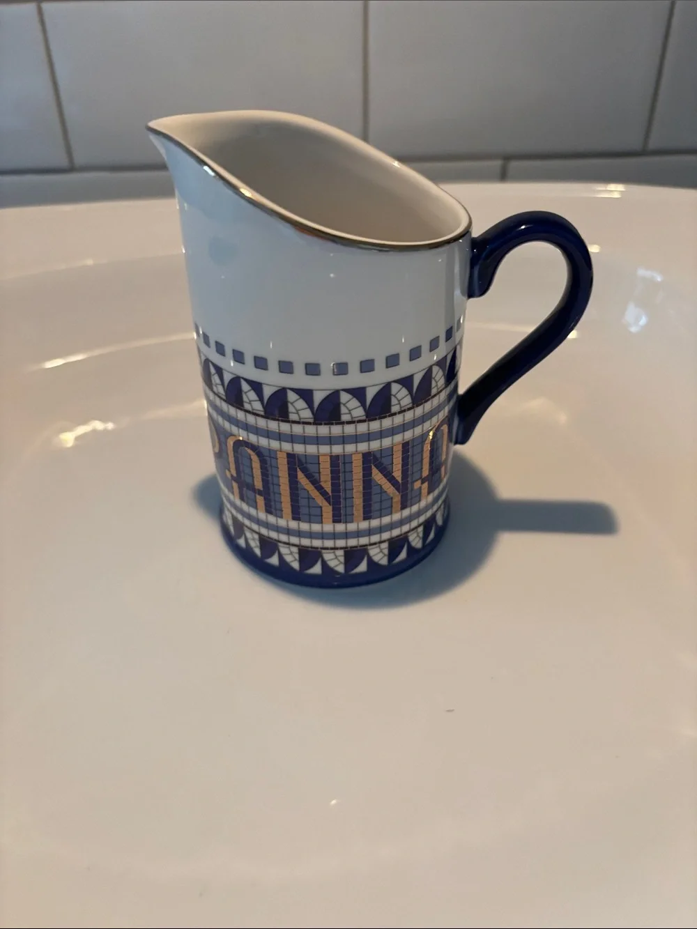 Anthropologie Panna creamer with gold accents